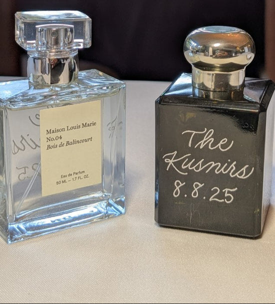 Hand engraved his and hers perfume and cologne bottles for bride and groom wedding gifts at Aldie Mansion in Doylestown, Pennsylvania.