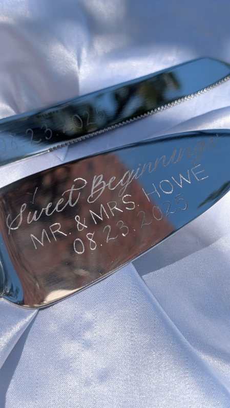 Hand engraved wedding cake cutting set for bride and groom Mr. and Mrs. Howe at The Belvedere in Baltimore, Maryland.