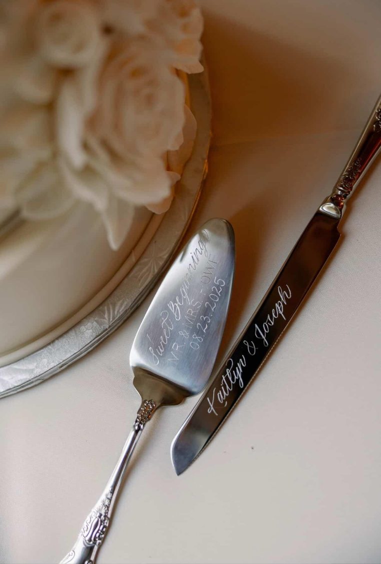 Hand-engraved Mr and Mrs cake serving set with knife at a wedding reception at The Belvedere in Baltimore, MD.