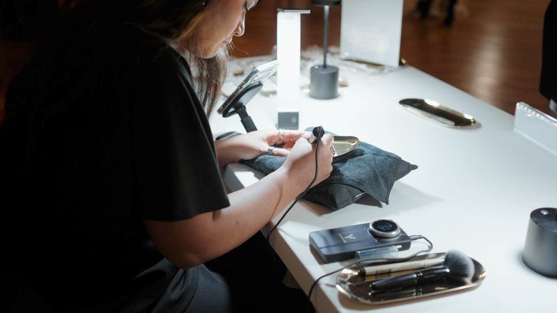 Hand engraving gold jewelry trays live by Tiffany Bauer at the Faire Sol Women Empowered event in Lancaster, PA.